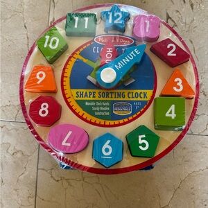 Melissa and Doug clock toy